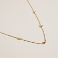 Gold Heart Charm Station Necklace