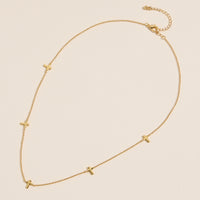 Gold Cross Charm Station Necklace