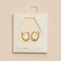Wavy 18K Gold Dip Hoop Earrings