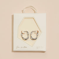 Wavy 18K Gold Dip Hoop Earrings