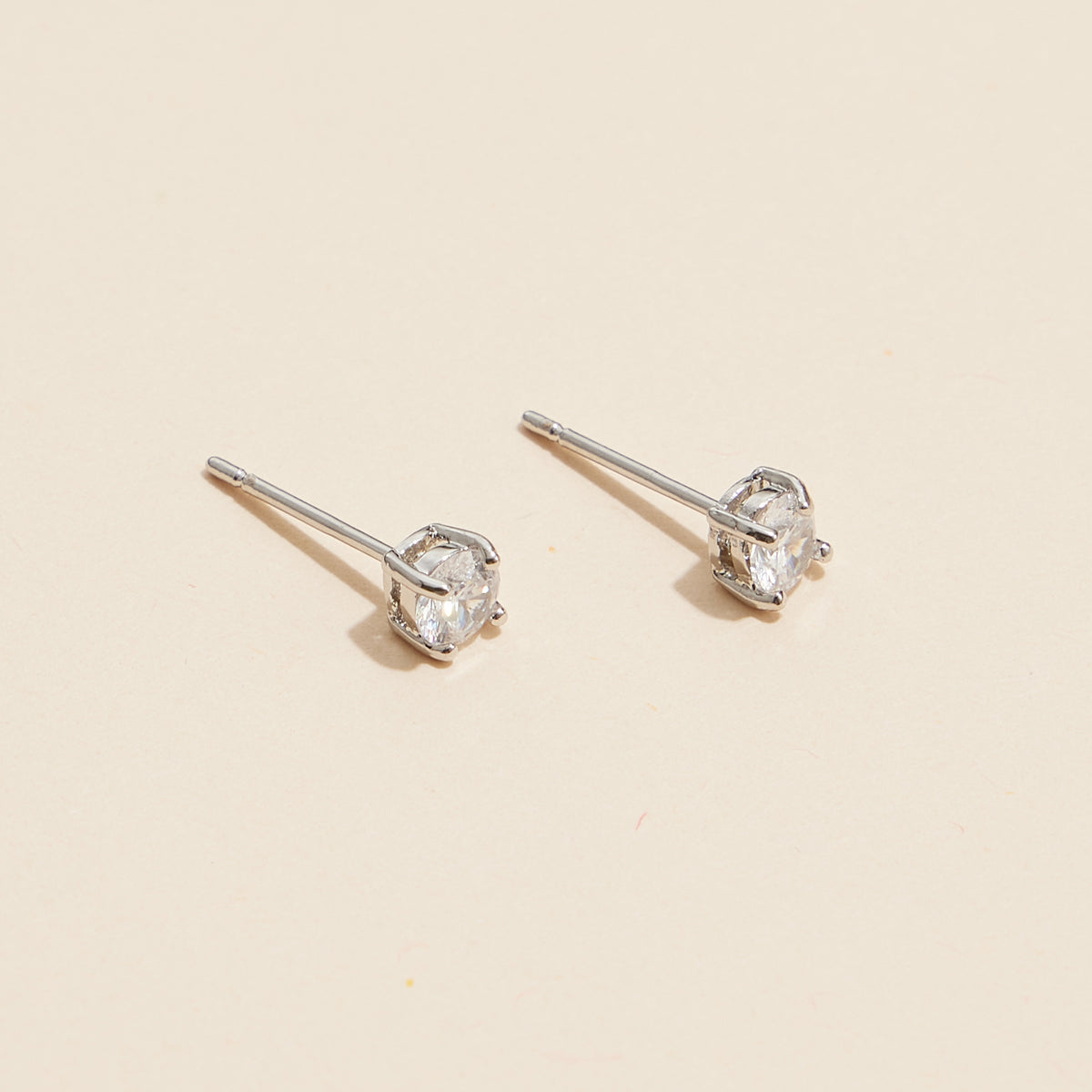 Gold and White Gold Stud Earrings with Sparkling Gemstones