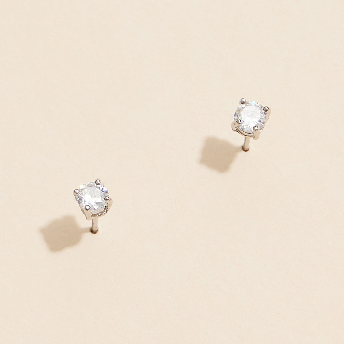 Gold and White Gold Stud Earrings with Sparkling Gemstones