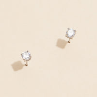 Gold and White Gold Stud Earrings with Sparkling Gemstones