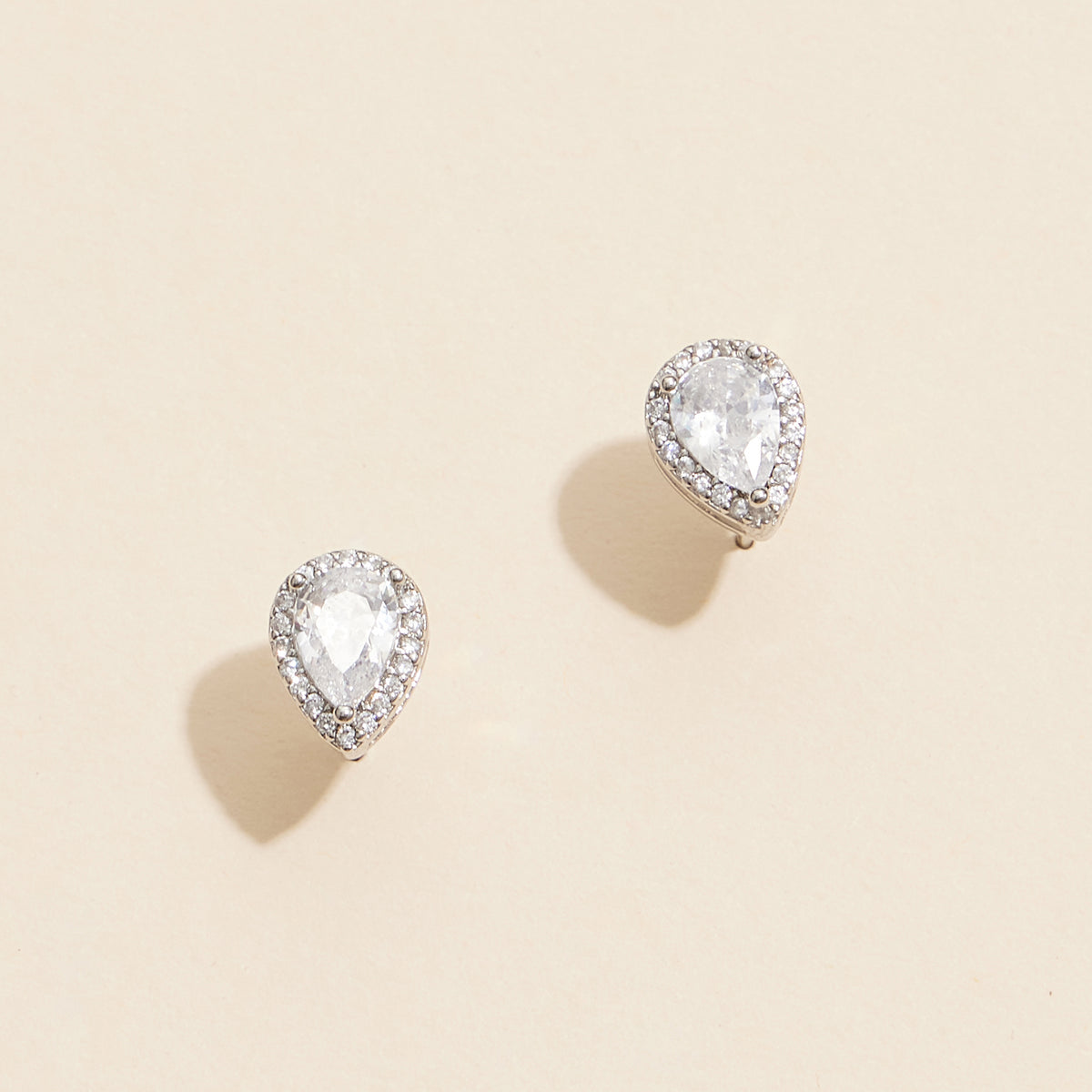Pear-Shaped Gold Stud Earrings with Diamond Accents