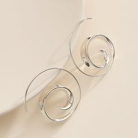 Spiral Swirl Hoop Earrings in Gold and Silver Modern Statement Jewelry