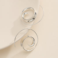 Spiral Swirl Hoop Earrings in Gold and Silver Modern Statement Jewelry