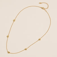 Gold Heart Charm Station Necklace