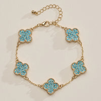 Colorful Shell Charm Bracelet with Gold Detailing