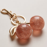 Glossy Cherry Keychain Charm — Red Gold