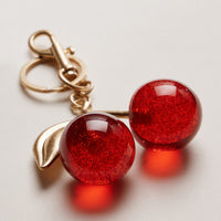 Glossy Cherry Keychain Charm — Red Gold