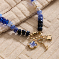 Textured Glass Bead Necklace with Charm Trio