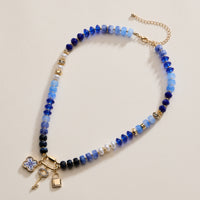 Textured Glass Bead Necklace with Charm Trio