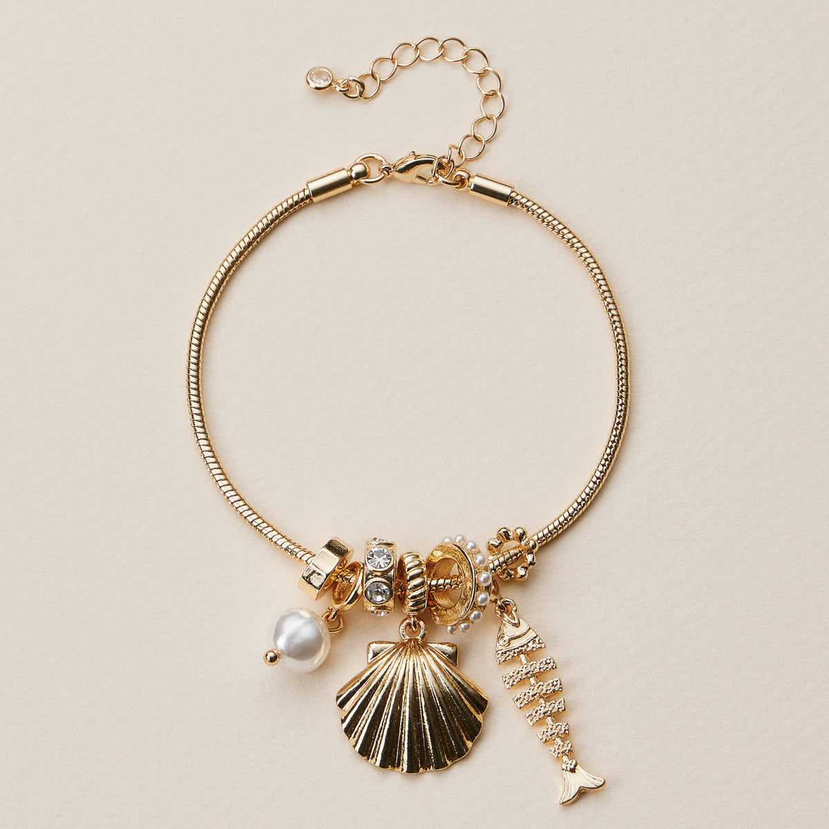 Gold Dipped Multi Charm Bracelet – Symbolic Pendant Collection