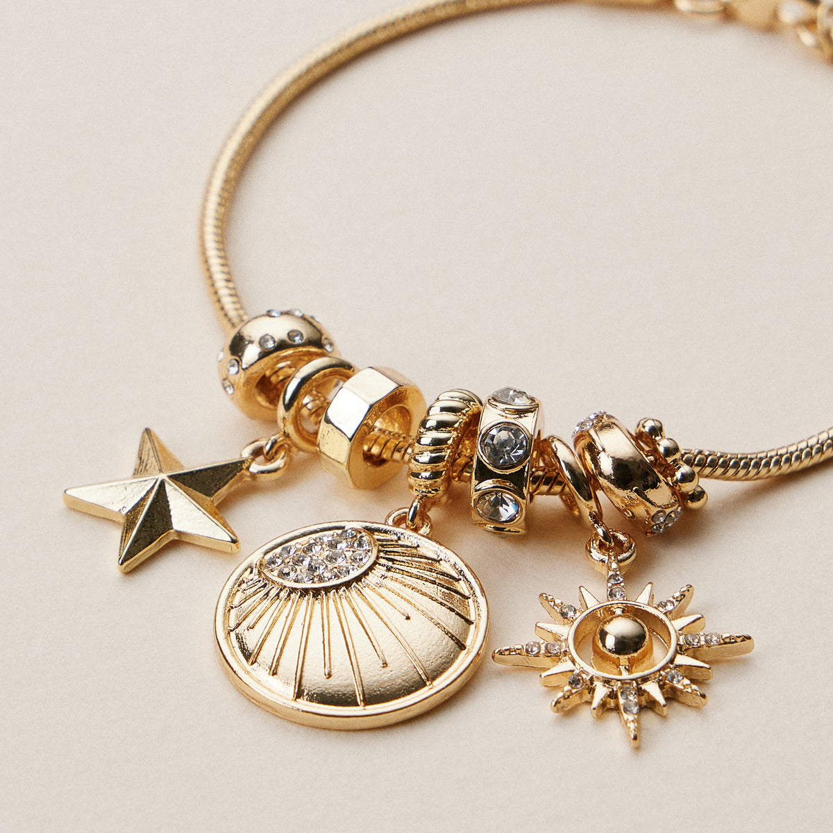 Gold Dipped Multi Charm Bracelet – Symbolic Pendant Collection