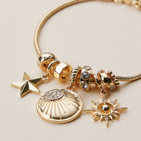 Gold Dipped Multi Charm Bracelet – Symbolic Pendant Collection