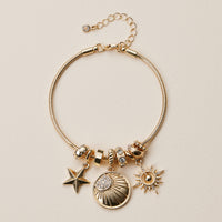 Gold Dipped Multi Charm Bracelet – Symbolic Pendant Collection