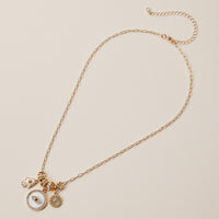 Gold Dipped Symbolic Multi Charm Necklace Collection