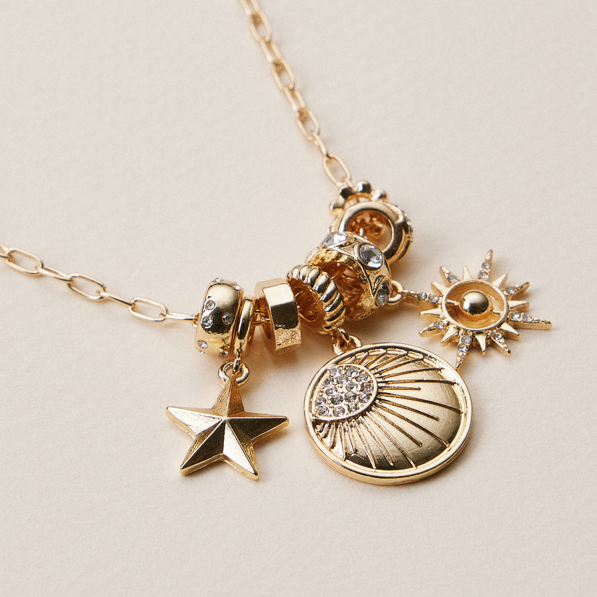 Gold Dipped Symbolic Multi Charm Necklace Collection