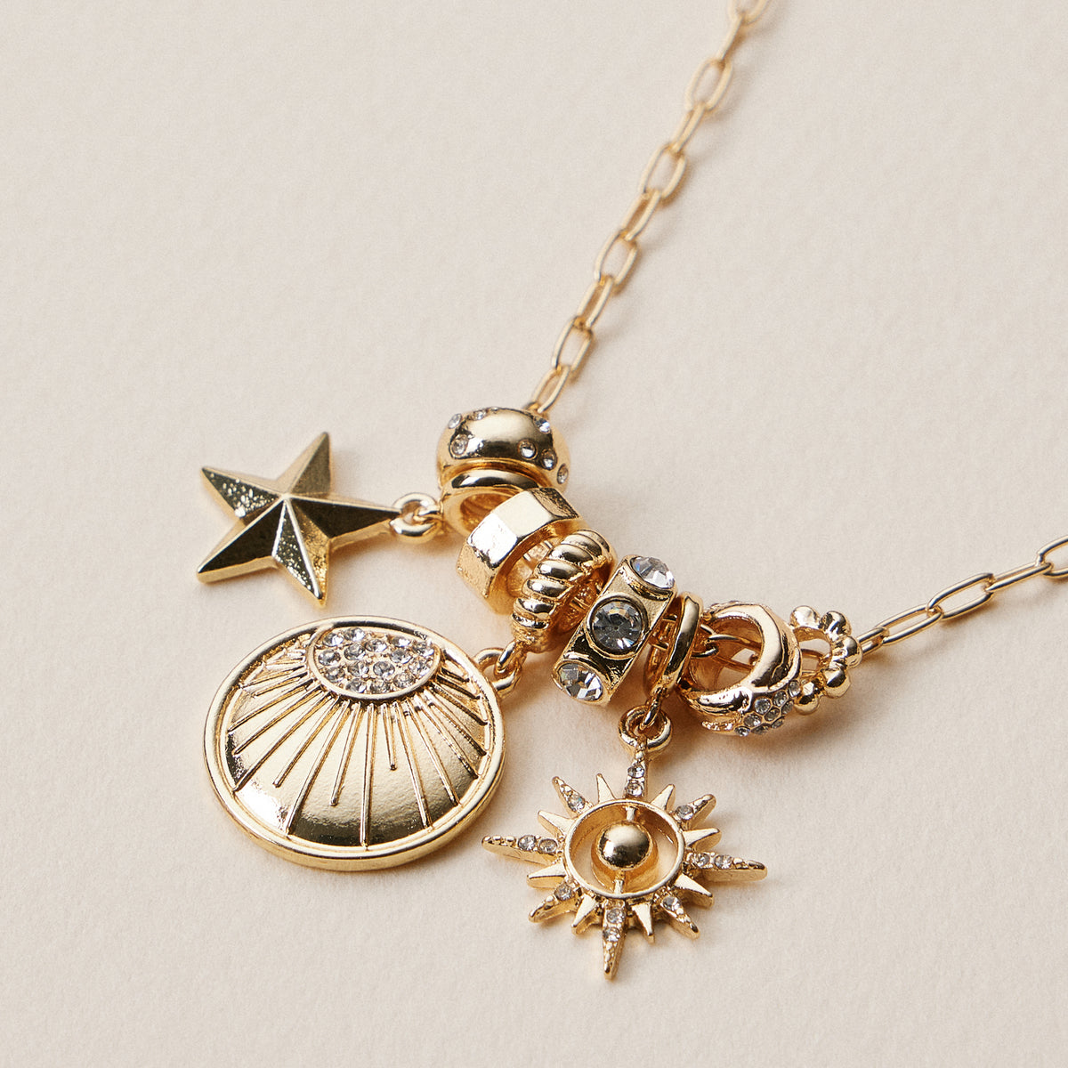 Gold Dipped Symbolic Multi Charm Necklace Collection