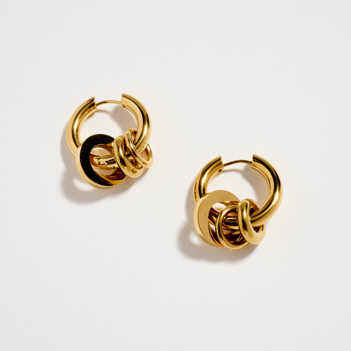 Stainless Steel Interlocking Hoop Earrings – Two Tone / Gold