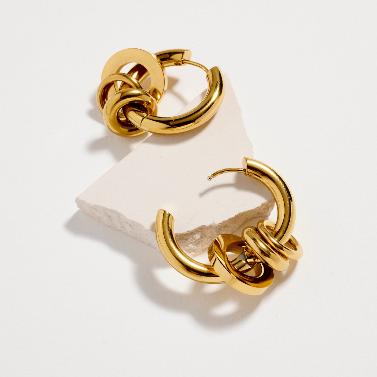Stainless Steel Interlocking Hoop Earrings – Two Tone / Gold