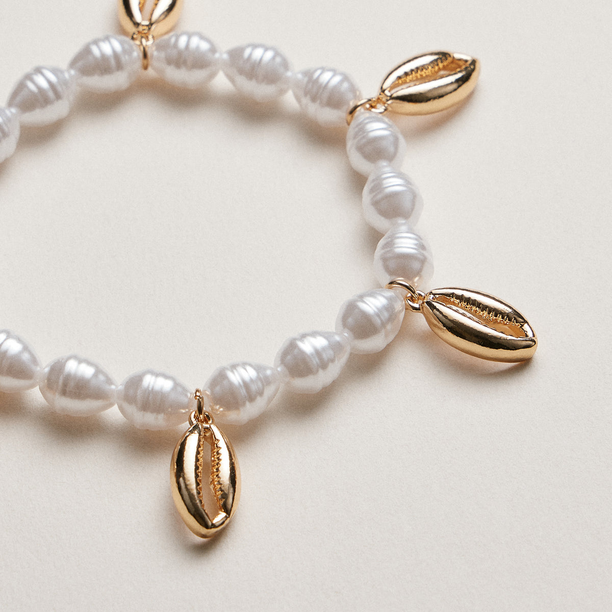 Pearl Cowrie Shell Bracelet — Gold and Silver Accent
