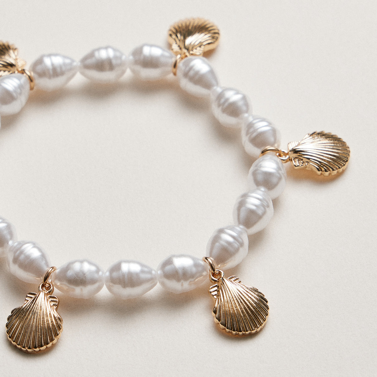 Pearl Bracelet with Gold Scallop Shell Charms