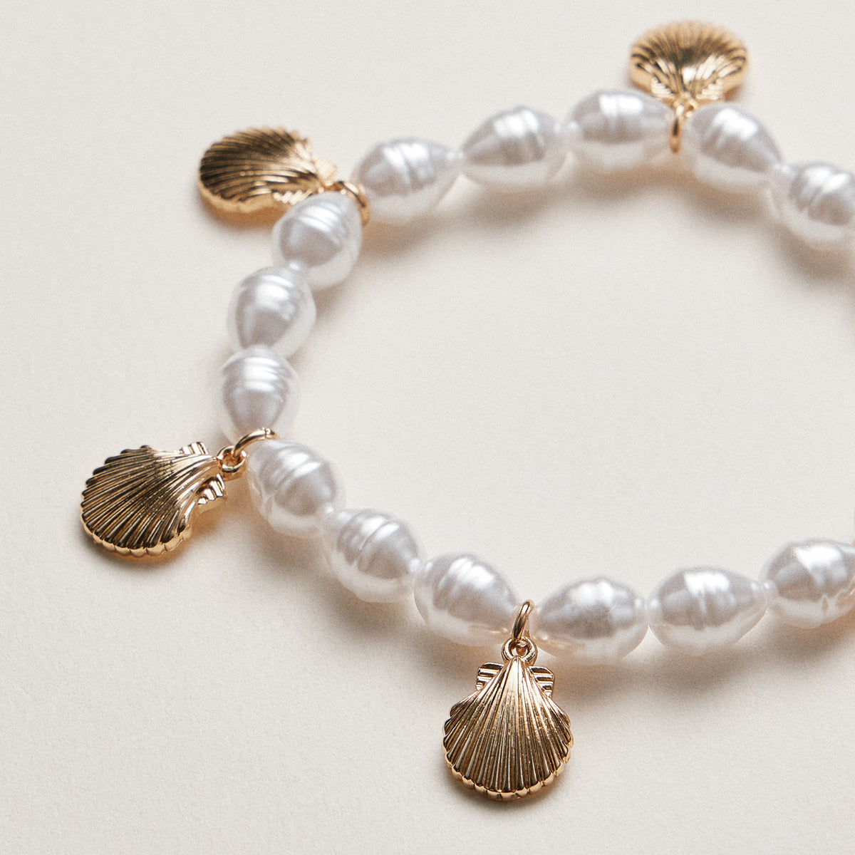 Pearl Bracelet with Gold Scallop Shell Charms
