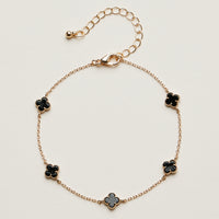 Mini Quatrefoil Station Bracelet | Delicate Multi Charm Jewelry