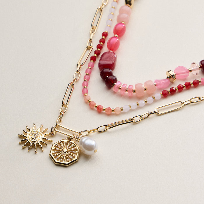 Layered Beaded and Chain Necklace with Sun and Pearl Charms – Gold Accent Design