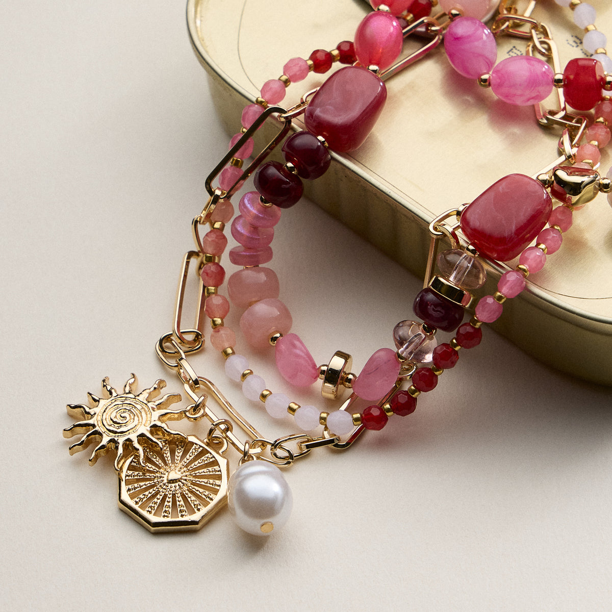 Layered Beaded and Chain Necklace with Sun and Pearl Charms – Gold Accent Design