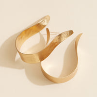 Gold-Tone Sculptural Wave Hoop Earrings – Bold & Modern Statement Earrings