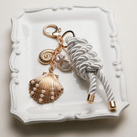Gold Coastal Bagcharm—Shell Pearl Starfish