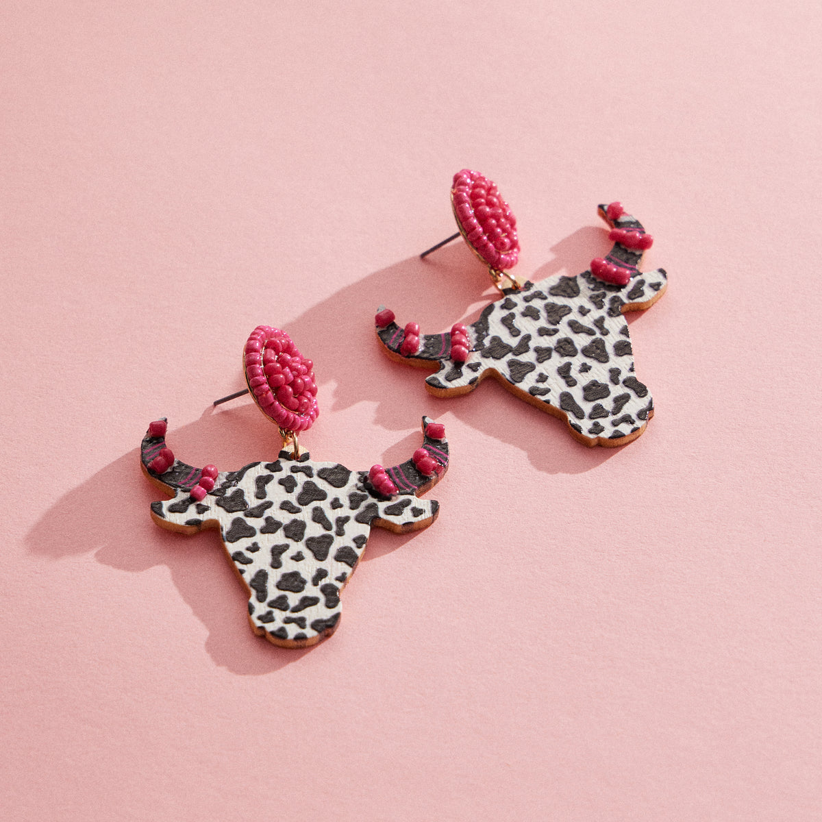 WOODEN COW HORNED HEAD EARRINGS