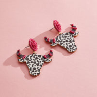 WOODEN COW HORNED HEAD EARRINGS