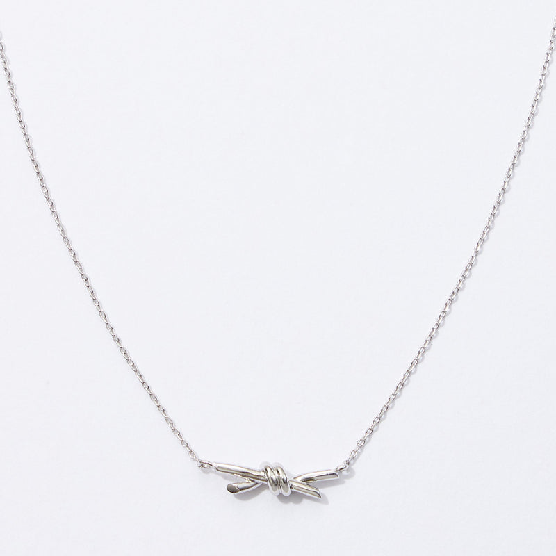 gold dipped knot pendant necklace