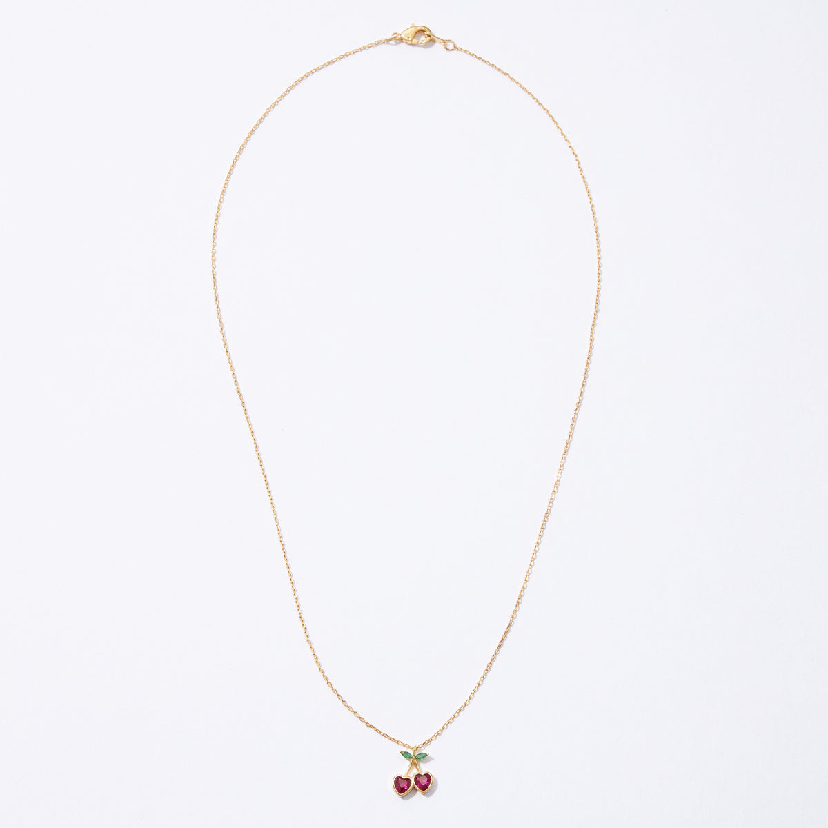 Gold Cherry Necklace with Heart-Shaped Red Stones & Green Leaf Accents – Dainty & Elegant Jewelry