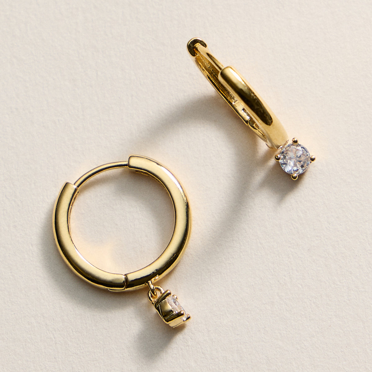 Gold Huggie Hoop Earrings with CZ Charm
