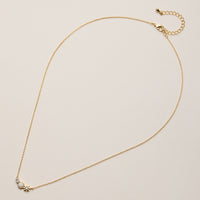 Gold Dipped Sun and Moon Charm Necklace