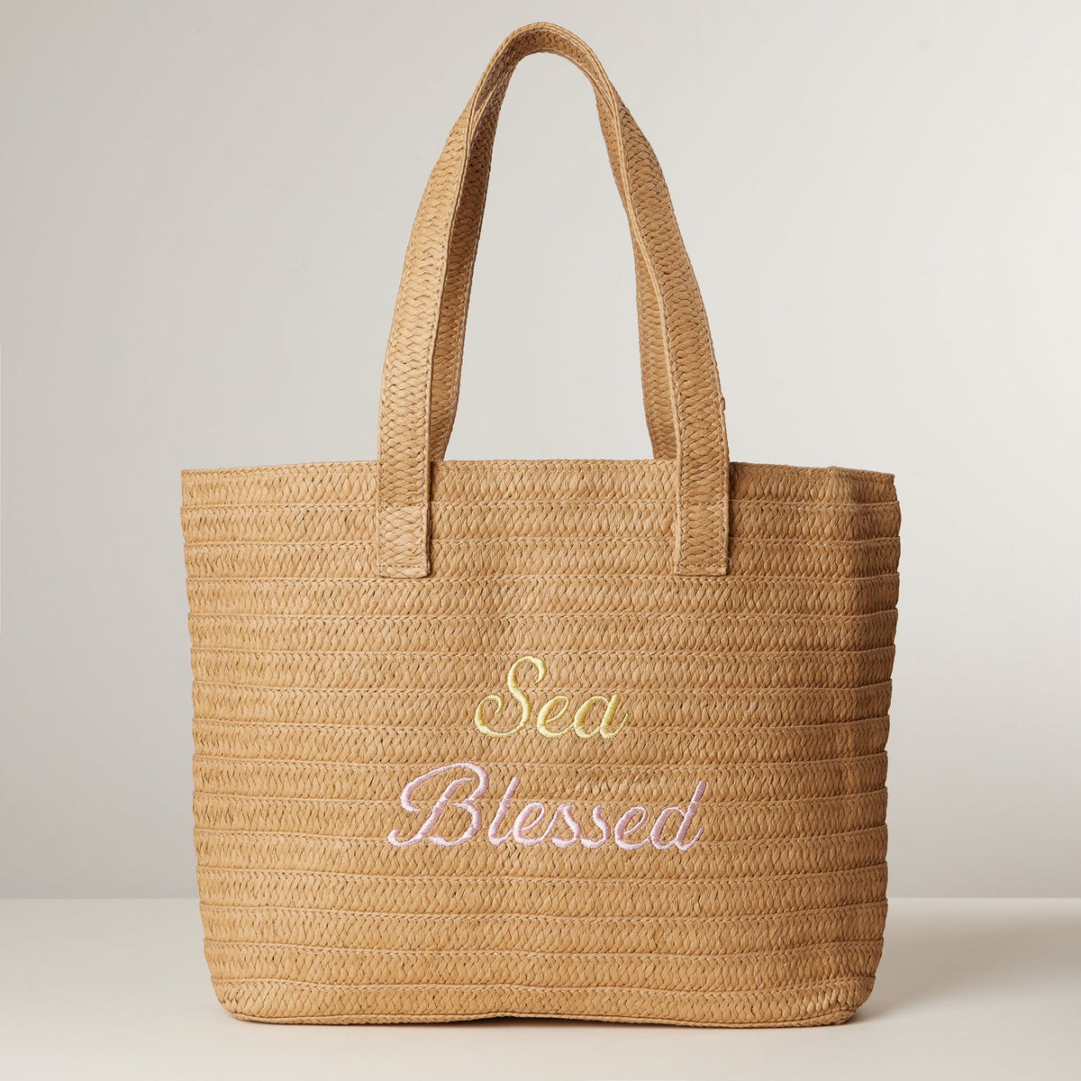 Sun Blessed Embroidered Raffia Tote Bag with Tassel Charm