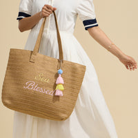 Sun Blessed Embroidered Raffia Tote Bag with Tassel Charm
