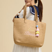 Sun Blessed Embroidered Raffia Tote Bag with Tassel Charm