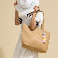 Sun Blessed Embroidered Raffia Tote Bag with Tassel Charm