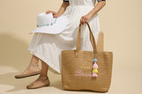 Sun Blessed Embroidered Raffia Tote Bag with Tassel Charm