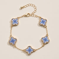 Colorful Shell Charm Bracelet with Gold Detailing