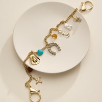 Western Charm Gold Chain Bag Strap with Horseshoe and Cowboy Hat Accents