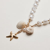 Coastal Charm Pearl Necklace | Gold Starfish & Seashell Pendant