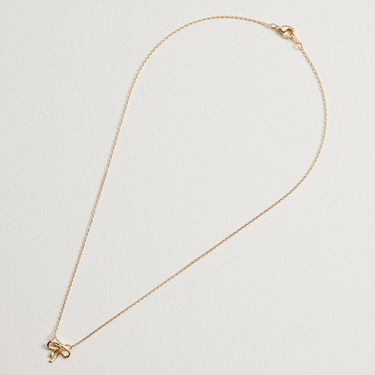 Gold Dainty Bow Pendant | Necklace